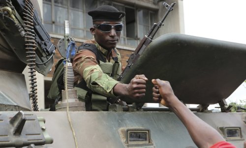 Fist pump military man in tank