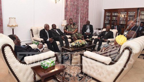President Mugabe meets ZDF Commander and SA envoys at State House