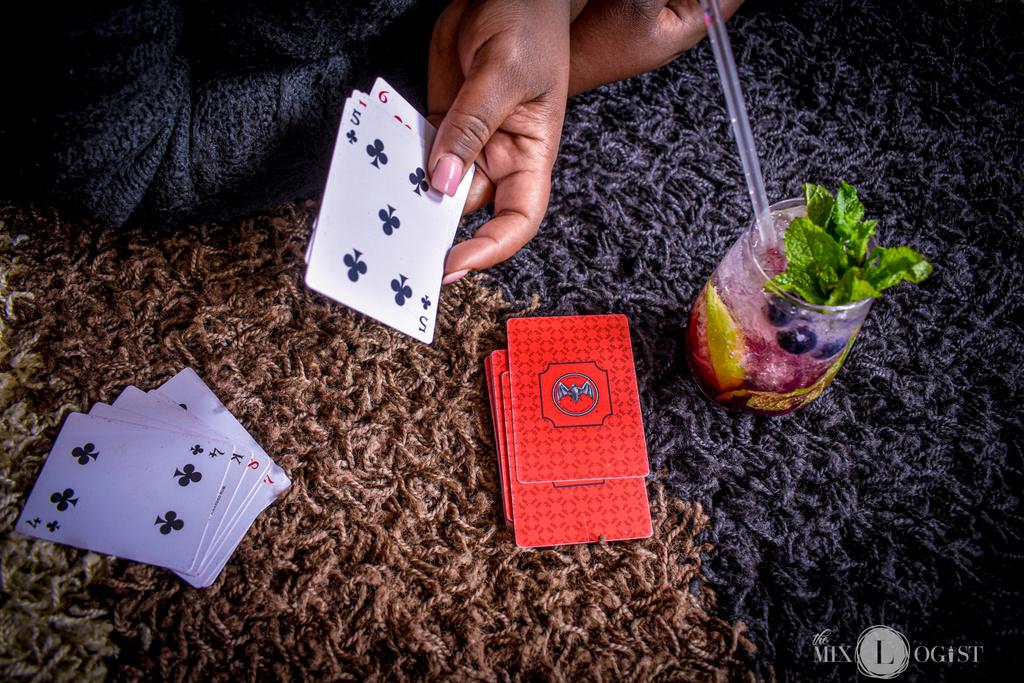 A game of crazy 8 and a blueberry Mojito