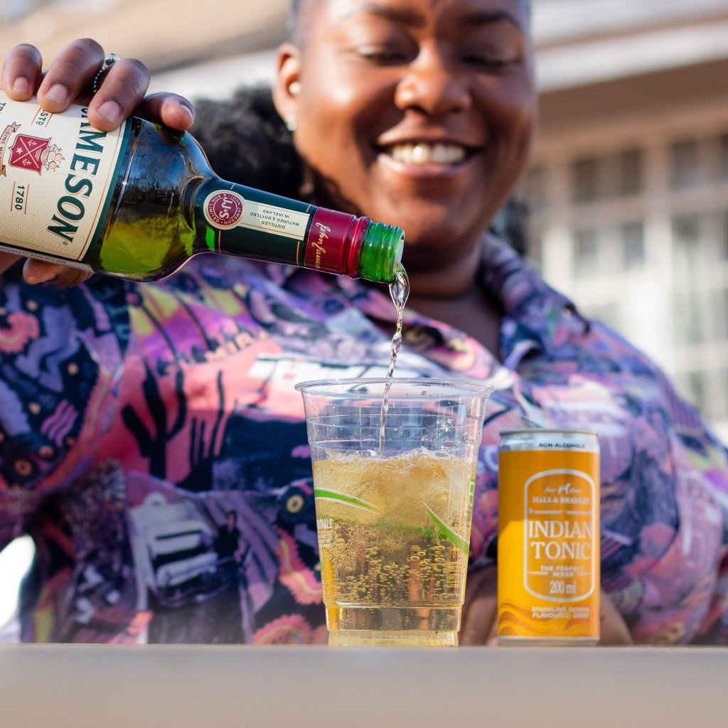 Pouring a Jameson Whiskey cocktail The Mixologist