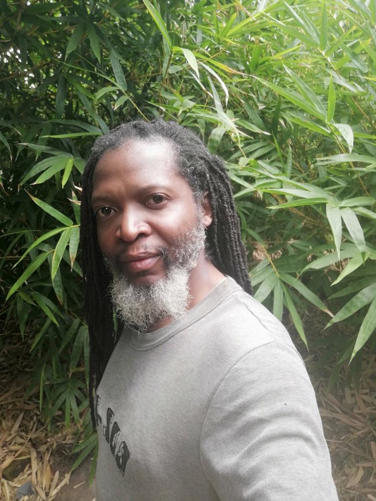 Uncle Beaton with salt and pepper dreadlocks