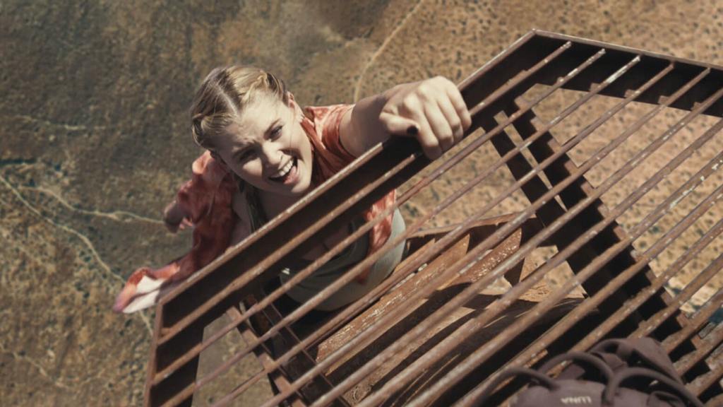 Danger D in Fall posing on tower edge