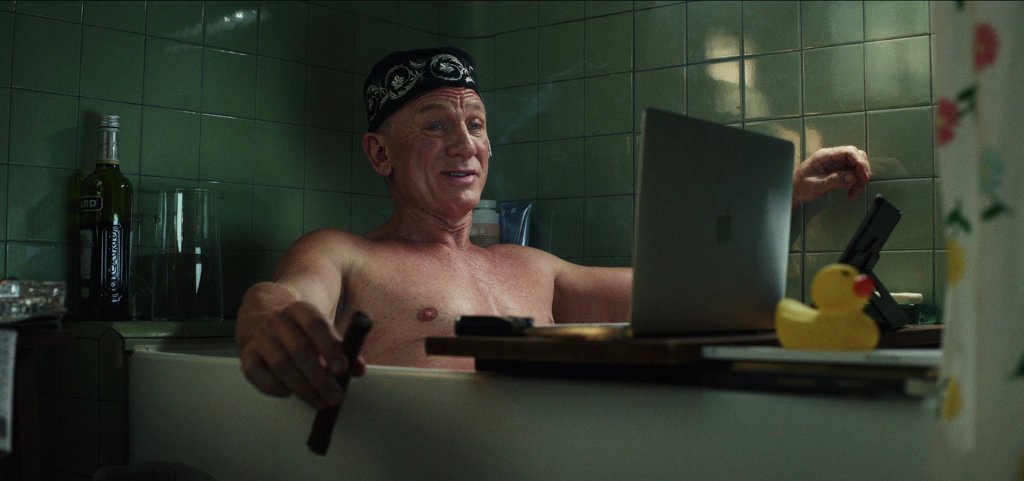 Detective Benoit Blanc in the bathtub playing a game of Among Us over Zoom 
Glass Onion A Knives Out Mystery
