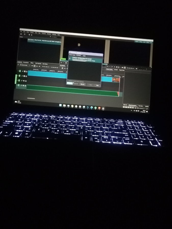 Laptop in a dark room with a Backlit Keyboard 