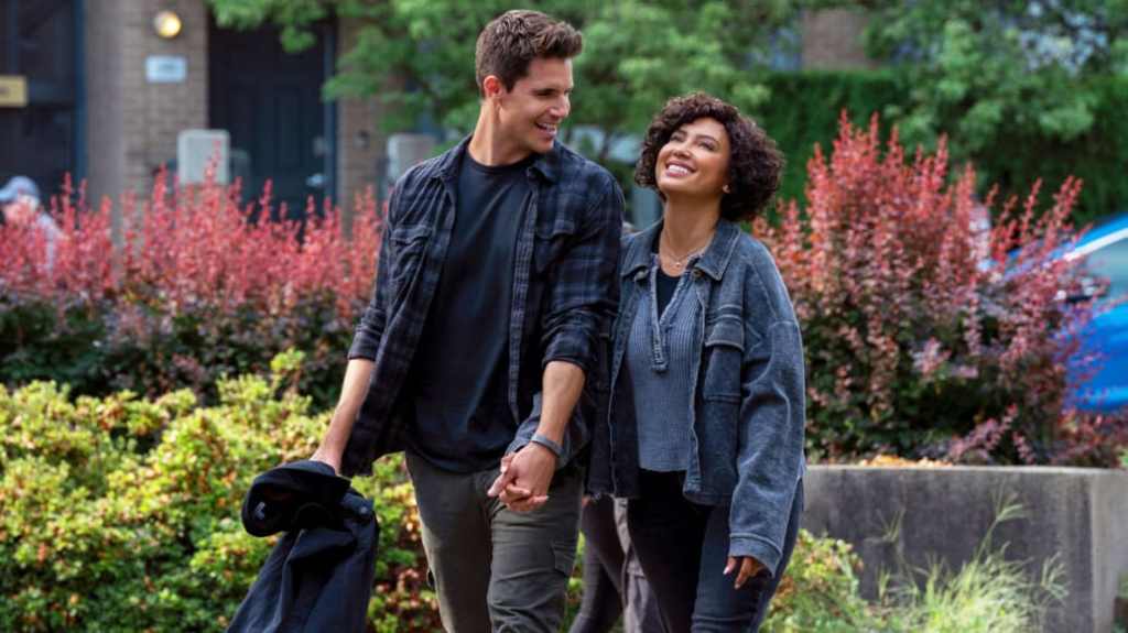 Nathan Brown holding hands with Nora in Upload Season 3