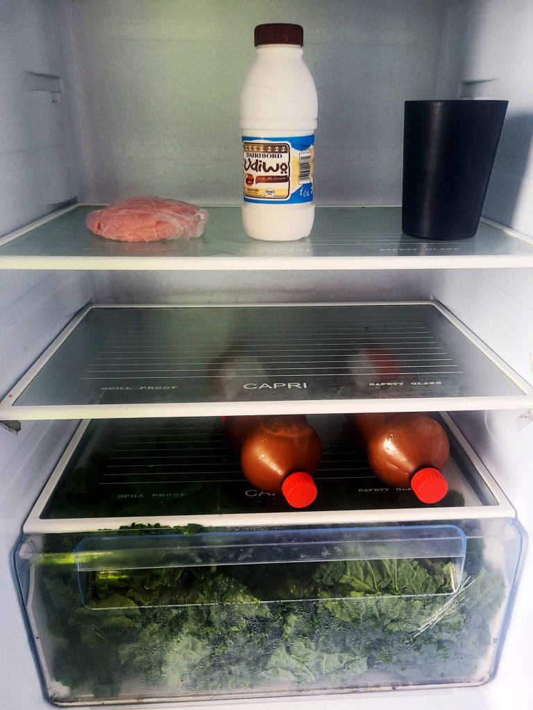 Fridge with Chibuku and vegetables