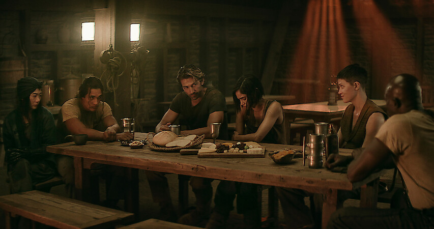 Rebel Moon Red table talk in Last Supper looking table arrangement in Rebel Moon Part Two