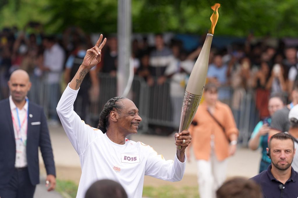 Snoop Dogg holding Olympic Torch Image credit: Pool/Getty Images