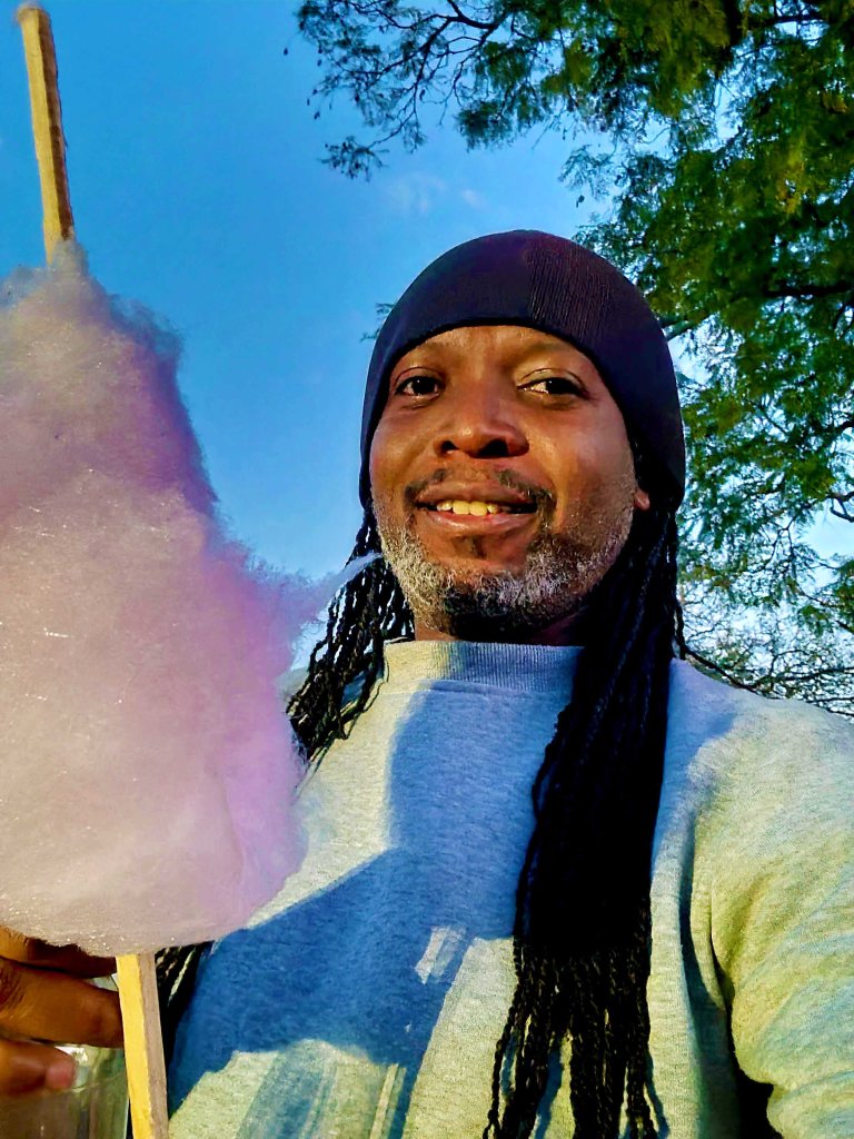 Beaton eating Candy floss
